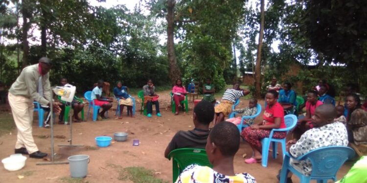 A community health volunteers teaches members of the public in Nairobi how to properly wash their hands. Photo/Courtesy